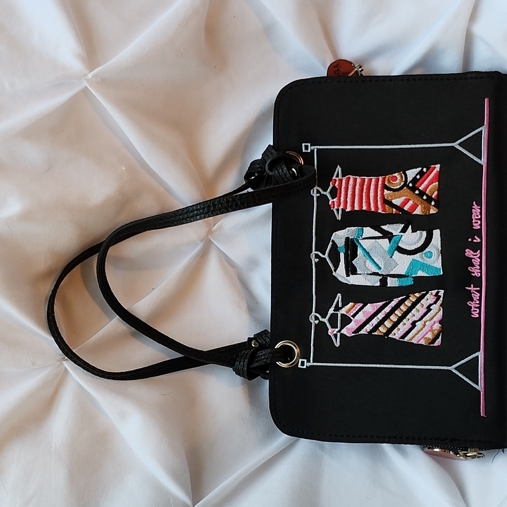 Black clutch with dresses